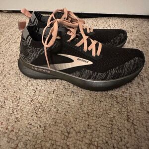 Brooks Black and Pink Athletic Shoes with Cushioned Sole and Textured Upper
